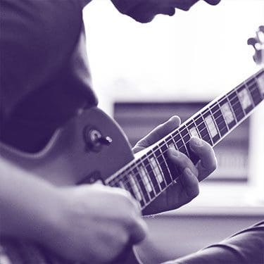 lær at spille guitar online